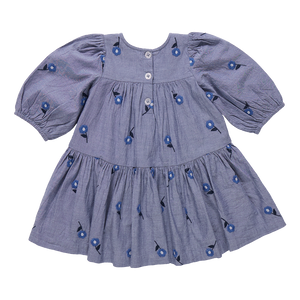 The Girls Fiona Dress in Blue Blossom Embroidery features vibrant embroidered blossom patterns that make your girl truly stand out. Designed with comfort and style in mind, this dress allows for easy movement while adding a magical touch to any occasion. Perfect for celebrations or everyday adventures, it brings a charming blend of elegance and playful style to her wardrobe.