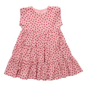 The Girls Peachy Dress in Pink Tiny Roses is a charming choice for fall occasions. Adorned with delicate pink roses and featuring a tiered skirt, this dress combines timeless style with playful elegance. Perfect for making your little girl stand out at any event, it offers both comfort and classic beauty.