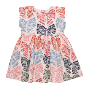 The Girls Adaline Dress in Multi Striped Bows brings a delightful mix of color and charm to your little girl’s wardrobe. Featuring playful striped bows, this dress adds a touch of whimsy while maintaining a stylish silhouette. Its comfortable fit ensures she can move freely, making it ideal for both special occasions and everyday wear. Elevate her look with a dress that combines fun patterns and effortless elegance.