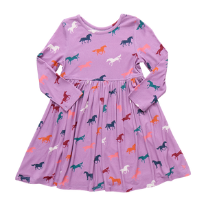 Dress your little one in the Girls Steph Bamboo Dress by Pink Chicken, featuring a charming horse pattern. Made from soft, breathable bamboo fabric, this long-sleeve, knee-length dress ensures all-day comfort while adding a playful splash of color to her wardrobe. Perfect for any occasion, it combines style and coziness effortlessly.