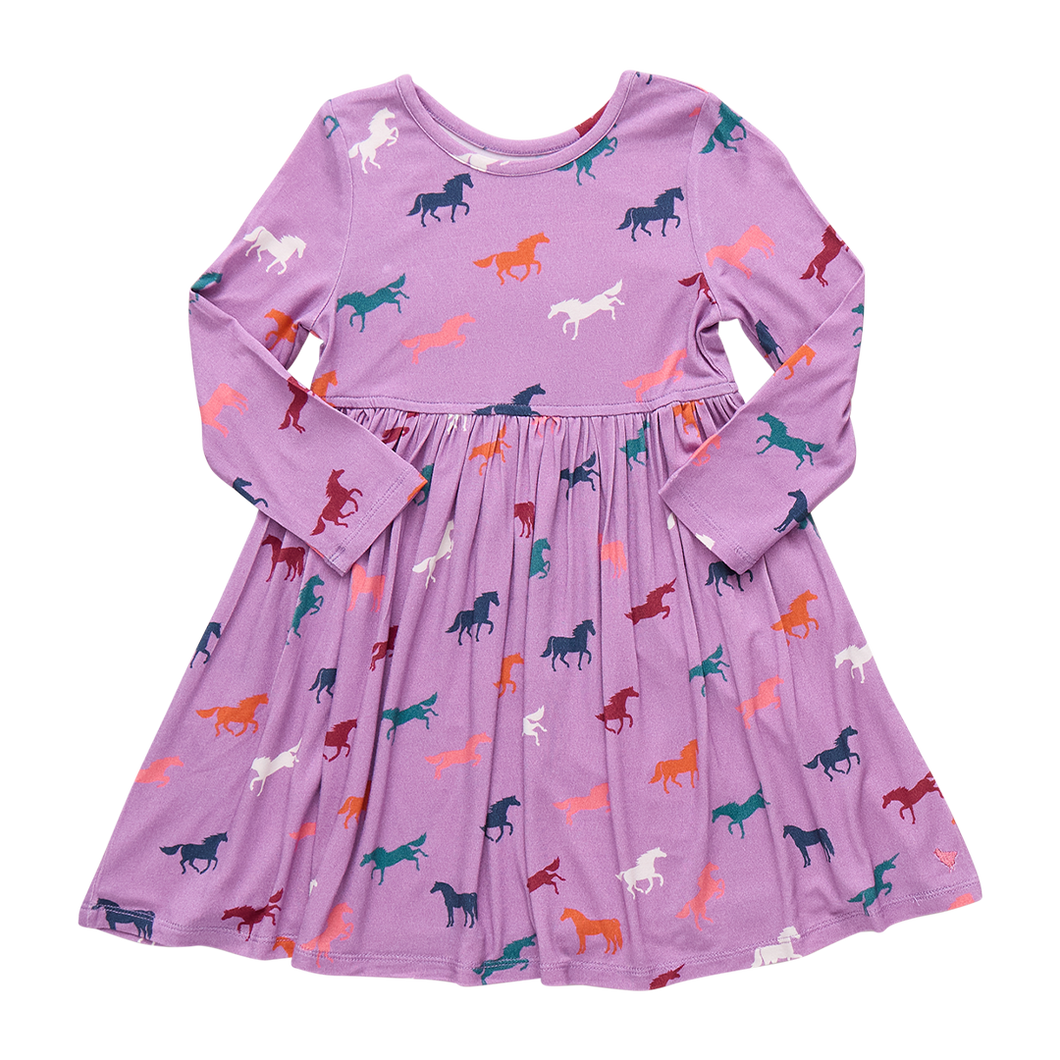 Dress your little one in the Girls Steph Bamboo Dress by Pink Chicken, featuring a charming horse pattern. Made from soft, breathable bamboo fabric, this long-sleeve, knee-length dress ensures all-day comfort while adding a playful splash of color to her wardrobe. Perfect for any occasion, it combines style and coziness effortlessly.