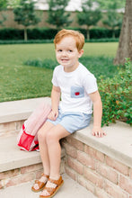 Load image into Gallery viewer, Dress your little boy in the charming Apple Pocket Shirt Short Set by The Proper Peony. The soft white Pima cotton shirt, featuring an adorable apple pocket, pairs perfectly with light blue shorts. It's not just stylish—it's incredibly comfortable, making it ideal for school days or playful adventures!
