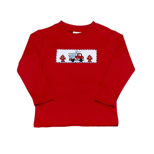 This charming Boys Smocked Fire Truck Tee from Zuccini Kids brings playful style to your toddler's wardrobe. Crafted from soft knit fabric in classic red, the tee features an eye-catching smocked design with hand-embroidered fire truck details that add texture and personality.