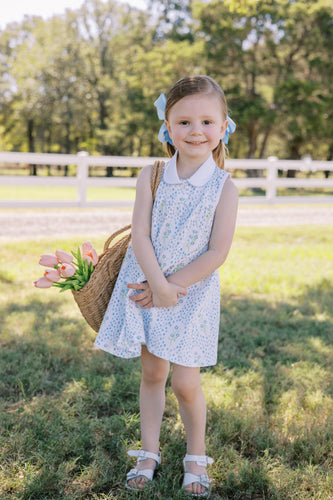The Proper Peony's Forget Me Not Dress is a must-have for any toddler girl! Made with 100% pima cotton, this dress features a charming Forget Me Not flower print, classic peter pan collar, and front buttons. Perfect for keeping your little one cool and stylish during the warmer months!

Sibling match in a Bloomer Set and Bubble!
