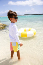 Load image into Gallery viewer, Introducing the Country Club Colorblock Trunk by The Beaufort Bonnet Company. These stylish and fun swim trunks for boys are perfect for the pool or beach. With a trendy colorblock design, your little one will make a splash in style!
