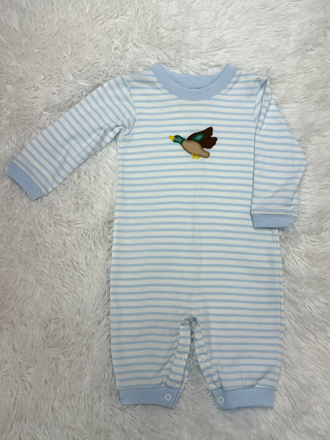 The Infant Boys Mallard Luke Bubble by Zuccini Kids combines comfort and charm in a soft light blue knit romper. Featuring an adorable mallard duck applique, this long-sleeve outfit is perfect for keeping your little one cozy while adding a playful touch to their wardrobe. Its gentle fabric ensures all-day comfort, making it an ideal choice for everyday wear or special outings. Elevate your baby's style with this irresistibly cute and practical romper.