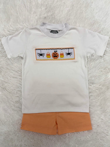 Celebrate fall in style with the Spooky Season Smocked Short Set from Cape Point Clothing. This charming outfit pairs a crisp white tee featuring a playful smocked 