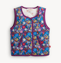 Load image into Gallery viewer, Embrace crisp autumn mornings with the Floral Quilted Reversible Vest by Magnetic Me. Soft quilted warmth and charming floral patterns combine with effortless magnetic closures, making layering easy and delightful for your toddler girl’s adventures this fall! Ready to brighten every chilly day?
