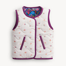 Load image into Gallery viewer, Embrace crisp autumn mornings with the Floral Quilted Reversible Vest by Magnetic Me. Soft quilted warmth and charming floral patterns combine with effortless magnetic closures, making layering easy and delightful for your toddler girl’s adventures this fall! Ready to brighten every chilly day?
