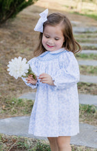 Load image into Gallery viewer, The Blue Blossom Billie Bishop Dress by Zuccini Kids delights with its charming blue floral print, timeless smocked neckline, and crisp white Peter Pan collar—crafted to make every moment picture-perfect for your little one. An exquisite choice for portraits and special occasions alike!
