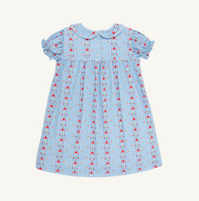 Load image into Gallery viewer, Celebrate new beginnings with the Holly Day Dress in First Day Flowers by The Beaufort Bonnet Company. Its charming floral pattern weaves in school details, while the classic silhouette and sweet Peter Pan collar make your little girl’s first day unforgettable—and every day after just as special!
