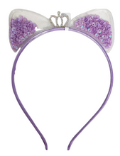 Load image into Gallery viewer, Add a whimsical touch to your little girl&#39;s accessories with Anuja Tolia&#39;s Embellished Ear Headbands! These playful headbands come in 3 colors and are sure to be a hit with your fashion-forward child.
