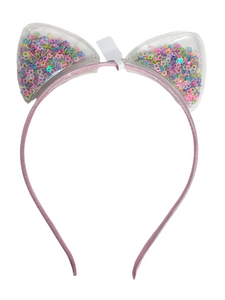Add a whimsical touch to your little girl's accessories with Anuja Tolia's Embellished Ear Headbands! These playful headbands come in 3 colors and are sure to be a hit with your fashion-forward child.