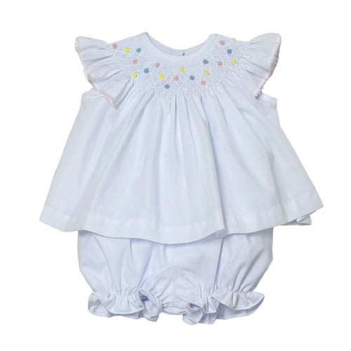 Introducing the Geo Flowers Bishop Bloomer Set from Zuccini Kids, a beautiful and versatile outfit for infant and toddler girls. This set includes a white batiste bishop dress with a smocked collar and vibrant flower blooms, paired with matching bloomers. Perfect for any occasion, this set will keep your little one looking adorable and comfortable.