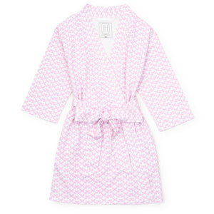 Elevate your little girl's relaxation time with the Gwen Girls' Spa Wrap in Pretty Pink Bows by Lila &amp; Hayes. Designed for comfort and style, this wrap offers a cozy, spa-like experience at home. Pair it with the Pretty Pink Bows Lounge Dress and Doll Dress to create an irresistible gift set that brings joy and matching charm for both girl and doll. Perfect for playtime or unwinding, this spa wrap is a delightful addition to any child's wardrobe.