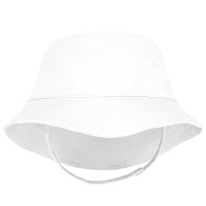 Cotton Twill Bucket Hat with Straps in White. Keep your little one cool and stylish with our classic Cotton Twill Bucket Hat. Our hat features an adjustable chin strap with an ultra-soft fastener and a UPF 50+ rating.