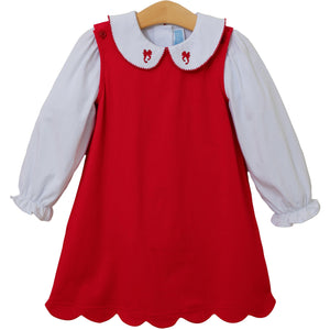 The Girls Holiday Bow Dress Set from Trotter Street Kids offers timeless festive style with a charming red dress featuring a delicate scalloped hem. Paired with a crisp white shirt adorned with a graceful bow collar, this set captures classic holiday elegance perfect for special occasions. Comfortable and eye-catching, it’s designed to make every celebration memorable.