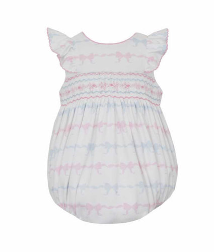 This adorable Ruffled Sleeve Smocked Bow Bubble by Petit Bebe is a must-have for your little one. With its delicate pink and blue bow knit design and charming smocking details, this bubble will surely add a touch of sweetness to any outfit. The ruffled sleeves add a playful touch, making it perfect for any occasion.