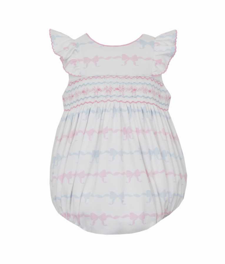 This adorable Ruffled Sleeve Smocked Bow Bubble by Petit Bebe is a must-have for your little one. With its delicate pink and blue bow knit design and charming smocking details, this bubble will surely add a touch of sweetness to any outfit. The ruffled sleeves add a playful touch, making it perfect for any occasion.