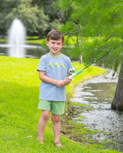 Load image into Gallery viewer, Discover the joy of adventure with the Hooked on Fishing Short Set by Trotter Street Kids! This delightful blue knit tee showcases charming fish appliqués, perfectly paired with comfy green shorts. Ideal for little anglers, it ensures breathability and comfort for all their spring and summer fishing escapades. Let the fun begin!
