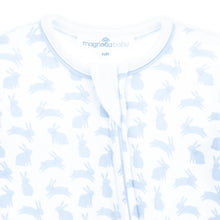 Load image into Gallery viewer, Dress your little one in the charming Leaping Bunnies Print Zip Footie in Light Blue by Magnolia Baby. Made from soft Pima cotton, this delightful outfit combines comfort with adorable style, making it an ideal choice for spring and Easter!
