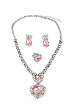 Load image into Gallery viewer, Classic glamour gets a modern twist with The Marilyn 4 Piece set. This bold and beautiful boxed-set includes pink &amp; silver clip-on earrings, a heart-shaped ring, and a coordinating necklace jam-packed with jewels.

- Keep away from fire and Small Parts.

- Batteries not required.

- Recommended Age: 3+
