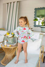 Load image into Gallery viewer, The Sarasota Surf-Suit in Berry Sweet combines playful style with essential sun protection, making it perfect for your little girl’s pool and beach adventures. Its long sleeves shield delicate skin while the charming TBBC pattern adds a touch of fun. Dress her in this vibrant suit and watch her enjoy every splash!
