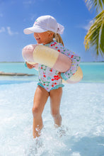 Load image into Gallery viewer, The Sarasota Surf-Suit in Berry Sweet combines playful style with essential sun protection, making it perfect for your little girl’s pool and beach adventures. Its long sleeves shield delicate skin while the charming TBBC pattern adds a touch of fun. Dress her in this vibrant suit and watch her enjoy every splash!
