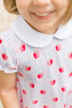 Load image into Gallery viewer, The Apple Blossoms Dress by The Proper Peony is a delightful blend of charm and comfort. Made from soft Pima cotton, it features a whimsical apple and bow print, along with an adorable Peter Pan collar. Perfect for the first day of school, this dress combines style and ease, ensuring your little one feels confident and cute!
