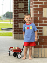 Load image into Gallery viewer, Celebrate your little boy’s first day in vibrant style with the School Appliqué Short Set by Trotter Street Kids! The royal blue striped tee, detailed with playful school-themed appliques, pairs perfectly with bold red shorts—making every moment feel joyful and unforgettable.
