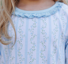 Load image into Gallery viewer, Wrap your little girl in the joyful charm of the Vineyard Blooms Bubble by Trotter Street Kids. The soft blue and green floral print blends sweetness with style, while the cozy long sleeves keep her comfortable on crisp fall days.
