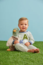 Load image into Gallery viewer, Meet Miller the Mallard by Mud Pie! Miller is a curious little explorer who loves splashing in puddles, flapping around the backyard, and waddling into new adventures. With his fuzzy feathers and floppy feet, he’s always ready to bring smiles, snuggles, and a whole lot of quack-tastic fun!

