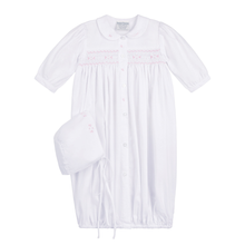 Load image into Gallery viewer, Feltman Brothers’ Girls Smocked Bud Take Me Home Gown wraps your little one in timeless elegance. The delicate pink smocking and embroidered Peter Pan collar create a precious, classic look, while the matching bonnet adds a soft, charming finishing touch for unforgettable first moments.
