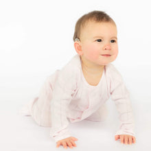 Load image into Gallery viewer, Magnetic Me’s Love Lines Pink Pointelle Magnetic Footie, also known as a sleeper, is made with magnetic closures that are quick, quiet, and a lifesaver for middle-of-the-night changes. Naturally soft + breathable for year-round wear, it's the perfect layette present made of organic cotton + delicate pointelle stitching.
