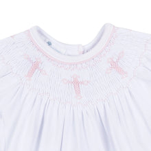 Load image into Gallery viewer, Graceful and timeless, the Forever Blessed Bishop Gown is a beautiful choice for life’s most meaningful moments. Designed with classic bishop-style smocking around the neckline, it features delicate hand-smocked cross motifs in soft pink, adding a sweet and sentimental touch.

