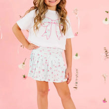 Load image into Gallery viewer, Move through spring with effortless style in this Sky Blue Floral Athletic Skort. Featuring a charming light blue and pink pleated print, it captures the season's trendiest athleisure aesthetic while delivering comfort for active play. The versatile design pairs beautifully with the matching Sky Blue Floral Bow Patch Short Sleeve T-Shirt, creating a coordinated look that transitions seamlessly from casual outings to weekend adventures. 

