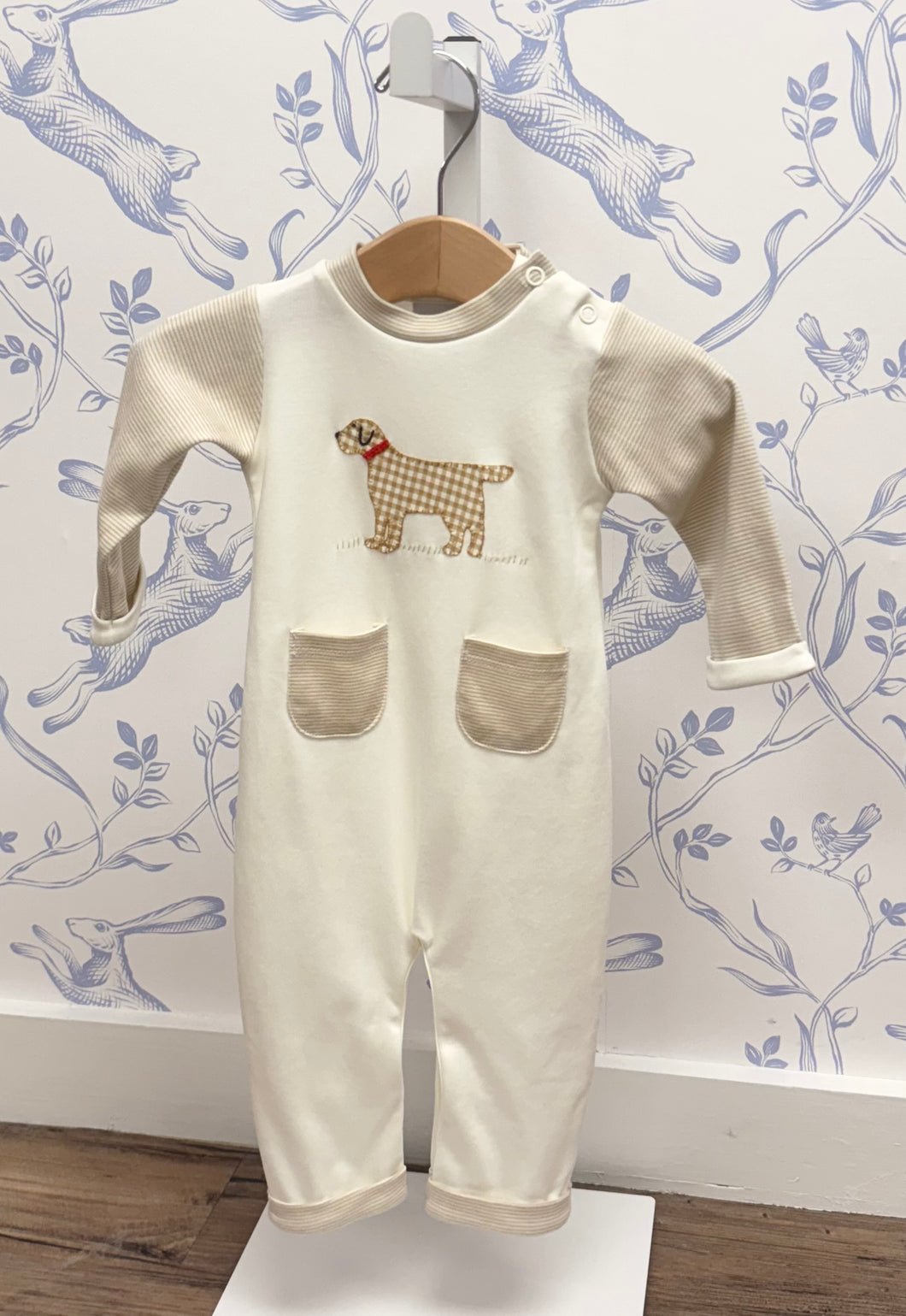 Introduce your little one to comfort and charm with this delightful Infant Boy's Checkered Puppy Play Romper from Squiggles. Crafted from premium pima cotton, this long romper features an adorable pup applique that captures hearts instantly. Striped accents and thoughtfully designed cuffed details add playful dimension to this versatile piece.