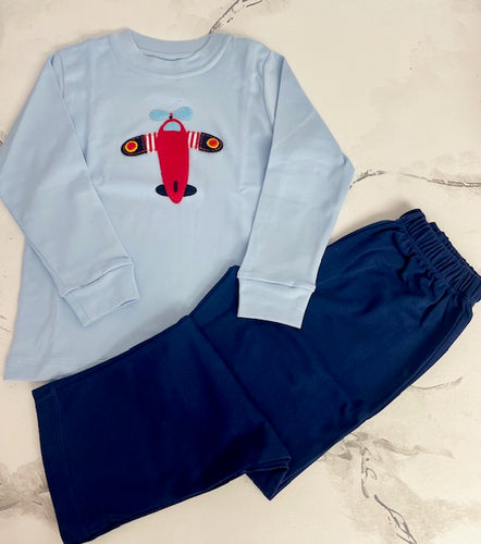 Dress your little one in style with our Airplane Shirt & Pant Set! This toddler boys' set features a light blue shirt with an adorable airplane applique and navy pants, perfect for any occasion. Made by Squiggles, your child will be comfortable and stylish all day long.
