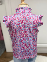 Load image into Gallery viewer, Elevate your tween's wardrobe with the Ellie Preppy Petals Sleeveless Top! This vibrant floral tee combines comfort with playful style, perfect for active spring and summer days. Let her express her personality and embrace the warmth of the season in this lively and chic piece!
