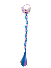 Load image into Gallery viewer, Elevate your daughter&#39;s style with the Fantasy Braided Ponytail Extension from Anuja Tulia! This playful and colorful ponytail comes with three different styles and colors, complete with a charming detail of either a butterfly, unicorn, or rainbow. Not only is it a fashion statement, but it also supports a great cause, with proceeds going to charity.
