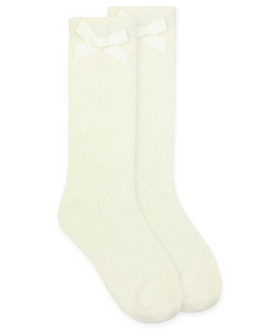 Update your little girl's sock collection with these adorable Ivory Pointelle Knee-High Socks by Jeffries Socks. Made with a delicate pointelle design, these socks are not only cute but also comfortable and perfect for any occasion. Give her feet the stylish and cozy treatment they deserve.