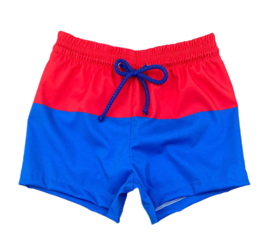 Celebrate your little one's love for their country with Boy's Patriotic James Swim Shorts from James & Lottie. These classic blue and red block design swim shorts are perfect for showing off their patriotism in style this summer. Get ready for some fun in the sun with this stylish swimsuit!