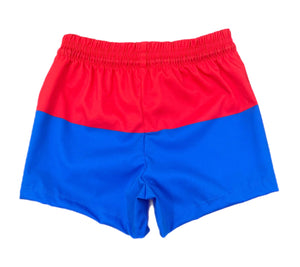 Celebrate your little one's love for their country with Boy's Patriotic James Swim Shorts from James &amp; Lottie. These classic blue and red block design swim shorts are perfect for showing off their patriotism in style this summer. Get ready for some fun in the sun with this stylish swimsuit!