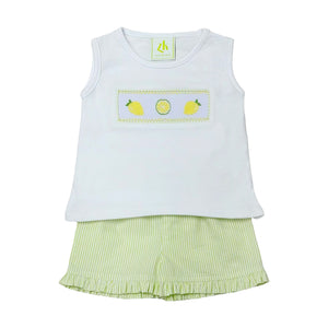 Get your little one ready for summer with the Lemon Blair Smocked Short Set from Zuccini Kids! This adorable set features a knit top with smocked lemon details for a touch of sweetness. The coordinating lime green and white seersucker ruffle edge shorts add a pop of color and summer vibes.!