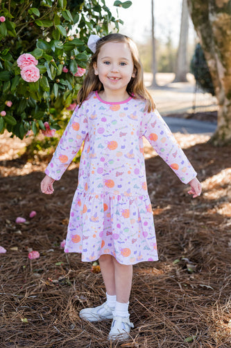 The Tricks & Treats Loren Dress from James & Lottie brings festive fun to any Halloween celebration. Its charming pink fabric showcases a playful Halloween print, while the sweet bow at the back neckline adds a delightful touch. Designed for comfort and movement, this dress lets girls enjoy playtime and festivities with ease and style. Perfect for making Halloween memories extra special.