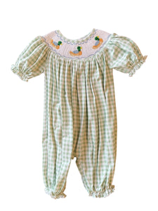 Dress your little one in timeless charm with the Smocked Bishop Riley Mallard Romper by Shop Teeta. Featuring a classic green and white gingham check, this romper is adorned with delicate smocking at the neckline and detailed embroidered mallard ducks, adding a sweet and playful touch. Perfect for coordinated family moments, it also pairs beautifully with matching sibling styles. This piece combines traditional design with exceptional craftsmanship, making it an irresistible choice for any special occasion 