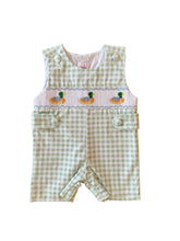 Load image into Gallery viewer, Dress your little one in timeless charm with the Boys Smocked Henry Mallard Jon Jon by Shop Teeta. Featuring a classic green and white gingham check, this Jon Jon is adorned with delicate smocking and detailed embroidered mallard ducks, adding a sweet and playful touch. Perfect for coordinated family moments, it also pairs beautifully with matching sibling styles. This piece combines traditional design with exceptional craftsmanship, making it an irresistible choice for any special occasion or everyday deli
