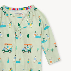 Get ready for a fun and easy bedtime with our Fairway Fetch Pajama Footie! Featuring playful dogs playing golf and driving golf carts, this footie is perfect for little ones who love to play. With an easy on and off design, bedtime will be a breeze. Order now and make bedtime a hole-in-one!