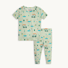 Load image into Gallery viewer, Get ready for a fun and easy bedtime with our Fairway Fetch Short Sleeve 2-Piece Pajama Set! Featuring playful dogs playing golf and driving golf carts, this pajama set is perfect for little ones who love to play golf. With an easy on and off design, bedtime will be a breeze. Order now and make bedtime a hole-in-one!

