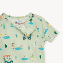 Load image into Gallery viewer, Get ready for a fun and easy bedtime with our Fairway Fetch Short Sleeve 2-Piece Pajama Set! Featuring playful dogs playing golf and driving golf carts, this pajama set is perfect for little ones who love to play golf. With an easy on and off design, bedtime will be a breeze. Order now and make bedtime a hole-in-one!
